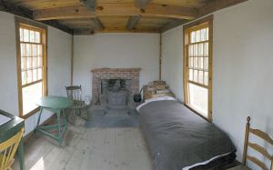 Author: Namlhots, via Wikipedia Commons inside Thoreau's cabin (reconstruction)
